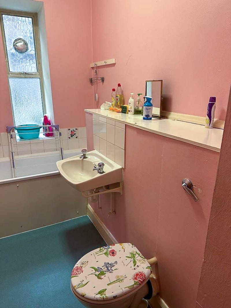 The same bathroom, the basin and WC corner, before the works